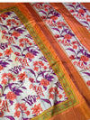Orange floral saree :Bold, bright, and blooming. ✨