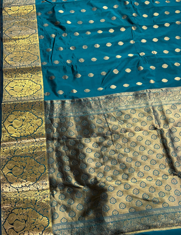 The Teal Treasure: Deep Peacock Silk Saree with Gold Zari Buttas