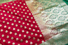 Red silk, green borders, and timeless vibes.