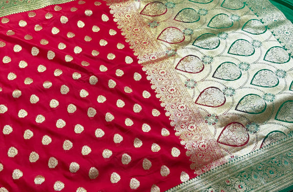 Red silk, green borders, and timeless vibes.