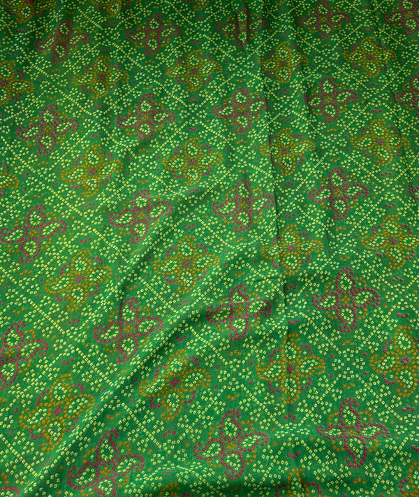 The Emerald Echo: Leaf Green Georgette Saree with Bandhani Print