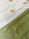 Timeless cream silk saree with a subtle light green border for a touch of graceful elegance. π€πβ¨