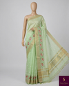 Fresh pista cotton saree with delicate cross-stitch embroidery for a subtle elegant touch. πβ¨