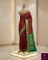The Royal Garnet: Maroon Silk Saree with Emerald Green Korvai Border