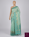 The Mint Meadow: Mint Green Linen Saree with Turquoise Floral Borders