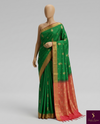 The Emerald Queen: Parrot Green Silk Saree with Crimson Banarasi Border