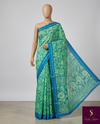 The Verdant Oasis: Mint & Sea-Blue Chiffon Saree with Graphic Floral Print