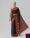 The Midnight Ikat: Charcoal Black Mul Mul Cotton Saree with Madder Red Panelled Pallu