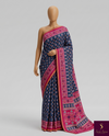 The Indigo Ikat: Indigo Blue Mul Mul Cotton Saree with Vibrant Fuchsia Pink Panelled Pallu