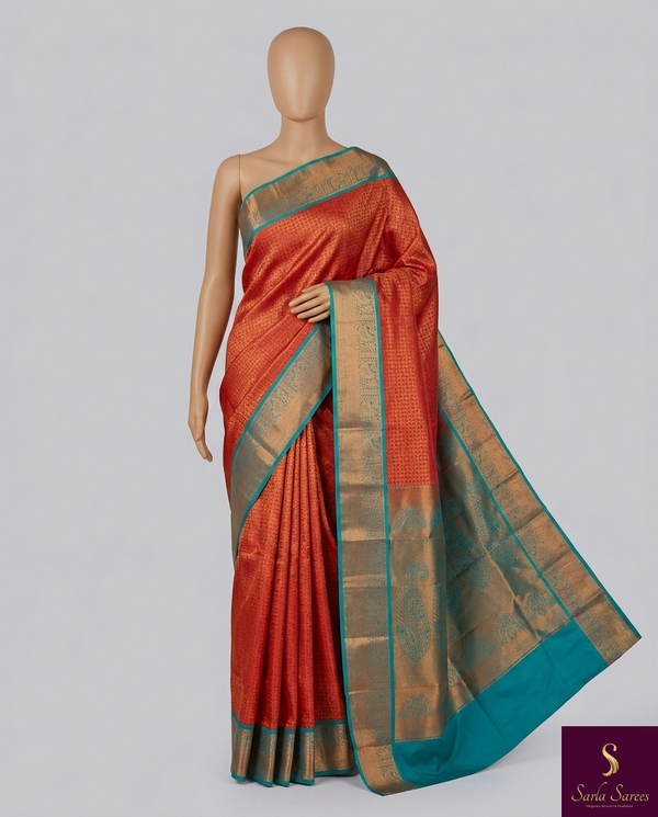 The Vermilion Loom: Burnt Red Kanchipuram Saree with Sea Green Contrast & Zari Brocade