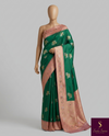 The Emerald Orchard: Bottle Green Silk Saree with Pastel Pink Kanjivaram-Inspired Border