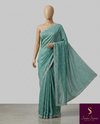 The Sage Horizon: Sea Green Textured Georgette Saree with Scalloped Moti & Cutdana Work Border