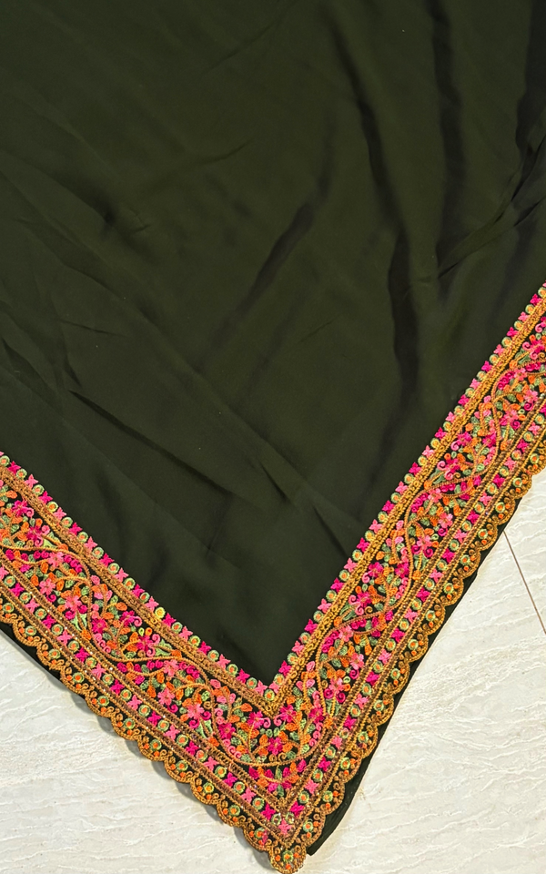 The Emerald Enigma: Deep Bottle Green Saree With Pink and Gold Embroidered Border