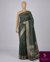 The Emerald Heritage: Deep Bottle Green Banarasi Silk Saree With Antique Gold Zari Jaal