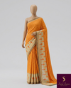 The Vasanta Malini: Sunset Orange Printed Chiffon Saree