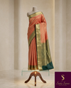 The Kalyani Mayura: Coral Peach & Bottle Green Kanchipuram Silk Saree