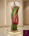 The Devika Mayura: Parrot Green & Rani Pink Kanchipuram Silk Saree