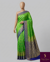 The Haripriya Vilasa: Parrot Green & Royal Blue Banarasi Silk Saree