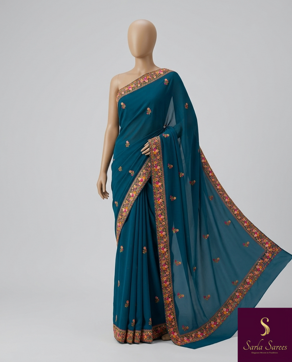 The Charvi Vilasa: Peacock Teal Embroidered Saree