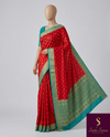 The Vasundhara Vilasa: Vermilion Red & Peacock Blue Mysore Crepe Silk Saree