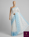The Lavanya Riva: Pristine White & Sky Blue Embroidered Cotton Saree