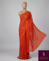 The Aahana Riva: Tangerine Orange Botanical Printed Saree