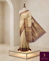 The Rukmini Vilasa: Champagne Gold & Plum Wine Kanchipuram Tissue Silk Saree