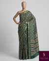 The Meenakshi Riva: Forest Green Patola Printed Saree