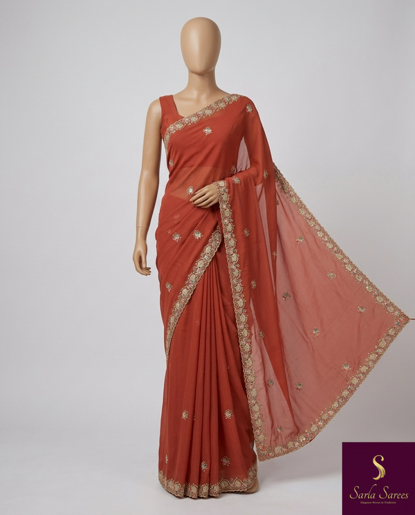 The Tarika Riva: Rust Terracotta Georgette Saree with Sequin Embroidered Border