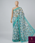 The Charvi Riva: Powder White & Cerulean Floral Printed Saree