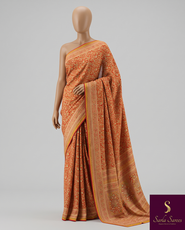 The Mandira Riva: Rust Orange & Golden Amber Printed Brasso Saree