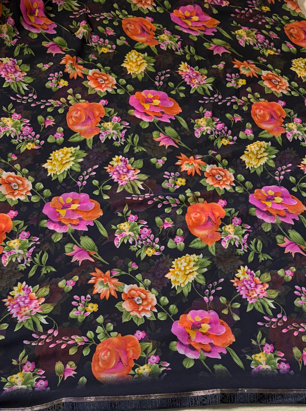 The Obsidian Meadow: Jet Black Chiffon Saree with Vibrant Floral Tapestry