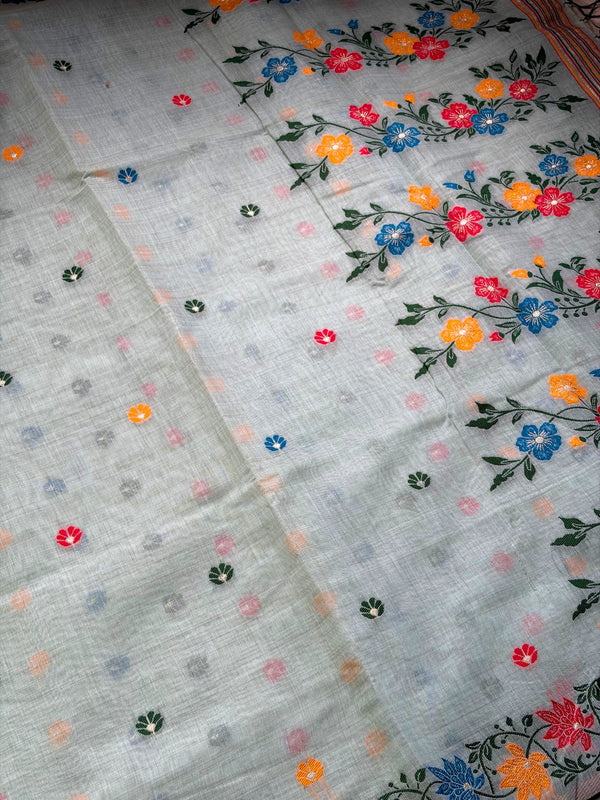 The Meadow Mist: Pastel Sage Linen Saree with Colorful Woven Floral Jamdani