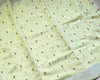 The Limelight Glow: Pastel Lemon Linen Saree with Micro-Floral Weaving & Silver Borders
