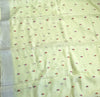 The Limelight Glow: Pastel Lemon Linen Saree with Micro-Floral Weaving & Silver Borders