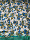 The Charvi Riva: Powder White & Cerulean Floral Printed Saree