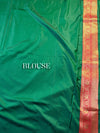 The Emerald Queen: Emerald Green Silk Saree With Crimson Red Zari Border