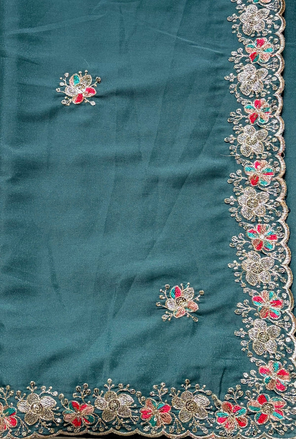 The Tanvi Riva: Peacock Teal Floral Embroidered Georgette Saree