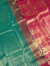 The Emerald Ira: Sea Green & Rani Pink Kanchipuram Silk Saree