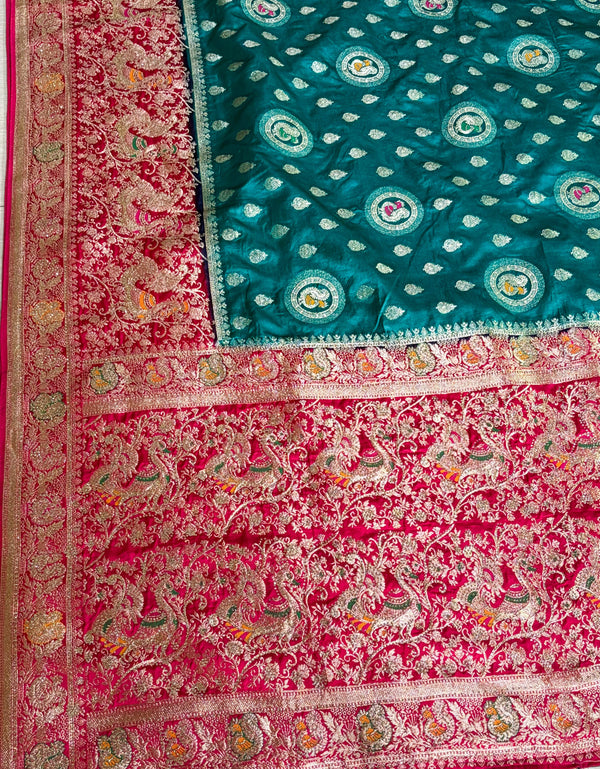 The Empress Teal: Teal Blue Banarasi Katan Silk Saree with Crimson Shikargah Border & Swarovski Crystals