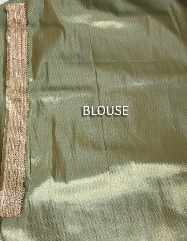 The Sage Luminary: Metallic Sage Green Silk Tissue Saree with Silver Lace Border