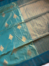 The Emerald Nila: Sage Green & Teal Woven Zari Silk Saree