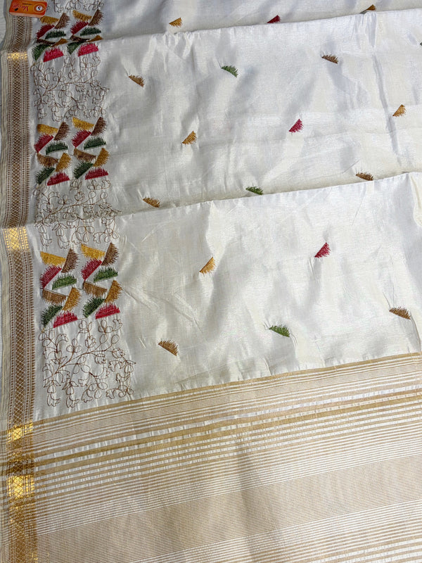The Ivory Aranya: Ivory Tussar Cotton Silk Saree With Multi-Color Tribal Embroidery