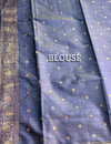 The Cerulean Citadel: Powder Blue Pure Linen Saree with Royal Indigo & Temple Border