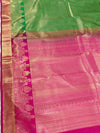 The Devika Mayura: Parrot Green & Rani Pink Kanchipuram Silk Saree