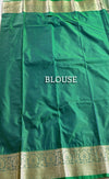 The Royal Loom: Emerald Green Kanchipuram Saree with Classic Golden Zari Butta Design