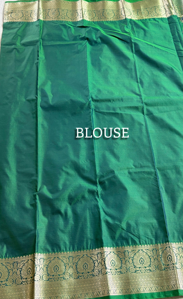 The Royal Loom: Emerald Green Kanchipuram Saree with Classic Golden Zari Butta Design
