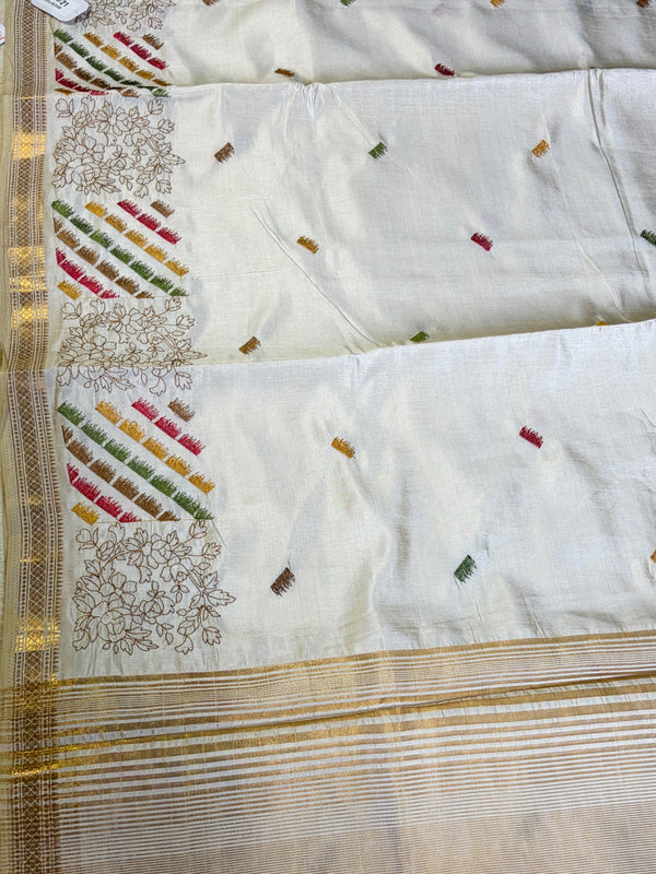 The Ivory Mayura: Ivory Tussar Cotton Silk Saree With Multi-Color Pastel Embroidery