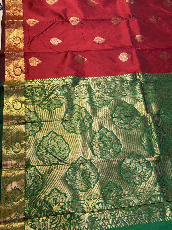 The Crimson Vasundhara: Deep Maroon & Emerald Green Heritage Woven Saree