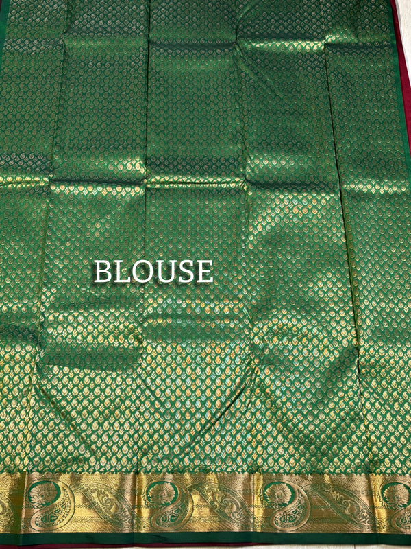 The Crimson Vasundhara: Deep Maroon & Emerald Green Heritage Woven Saree